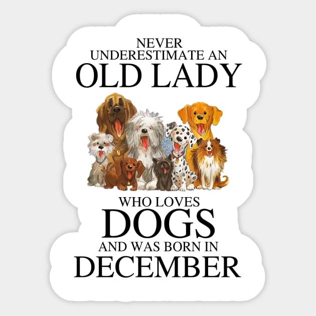 Never Underestimate An Old Lady Who Loves Dogs And Was Born In December Sticker by louismcfarland